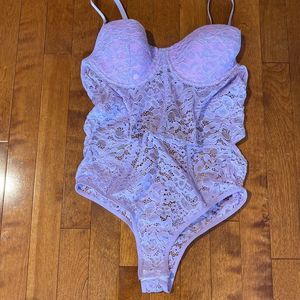 One piece lace lingerie in colour Lilac, size Lg